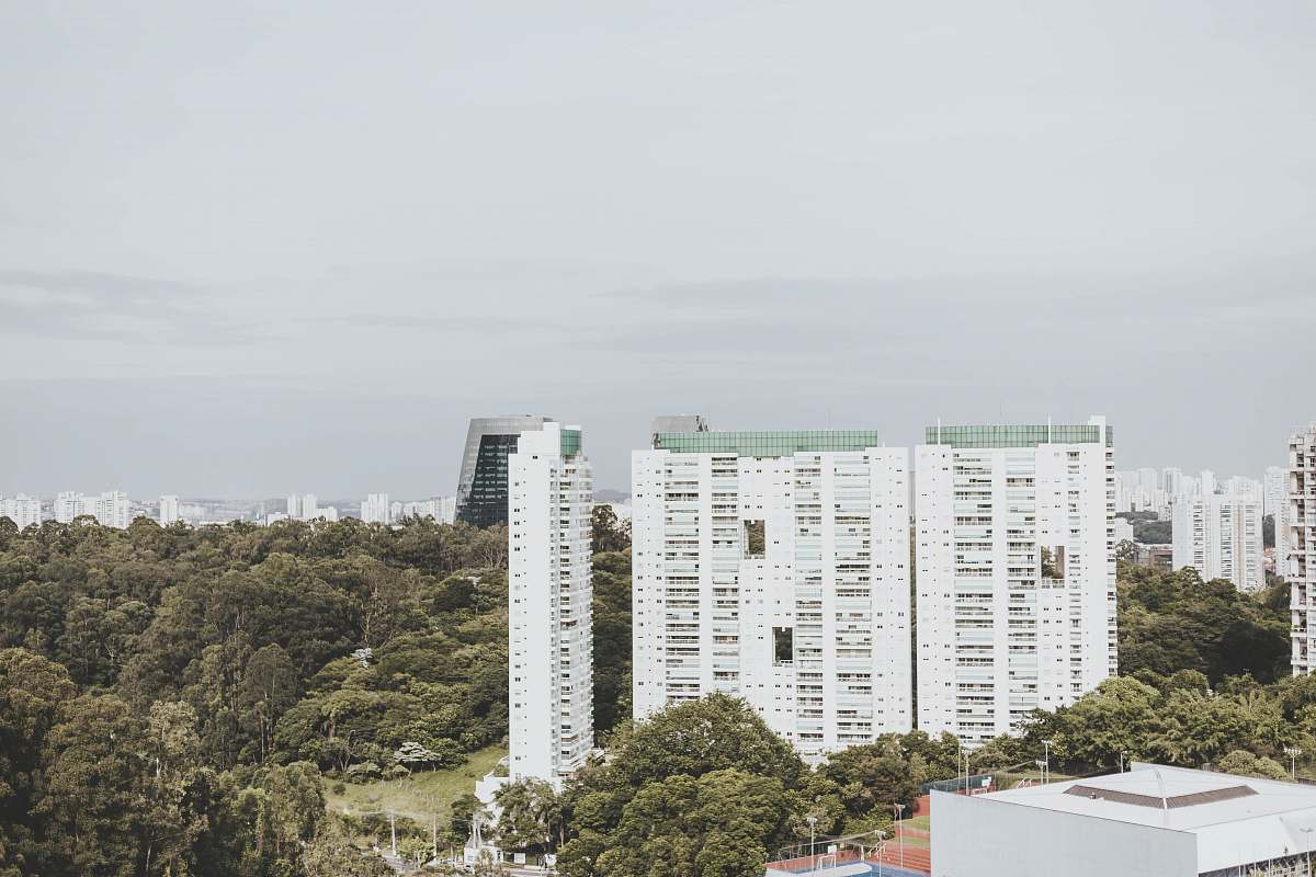 city high-angle photography of white high-rise building high rise