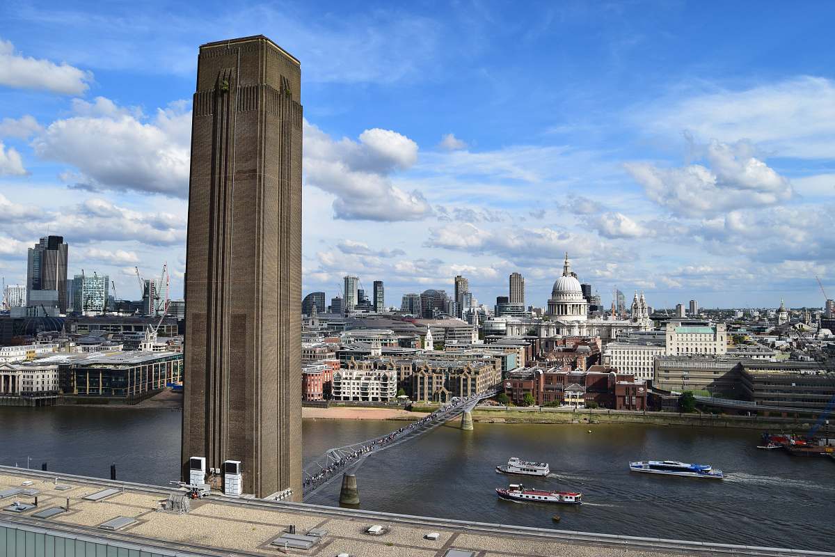 city high rise building near body of water architecture