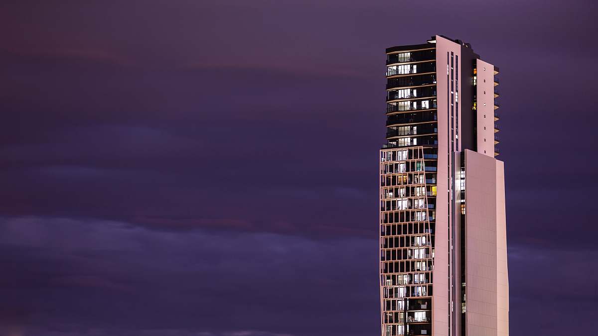 city highrise building during golden hour high rise