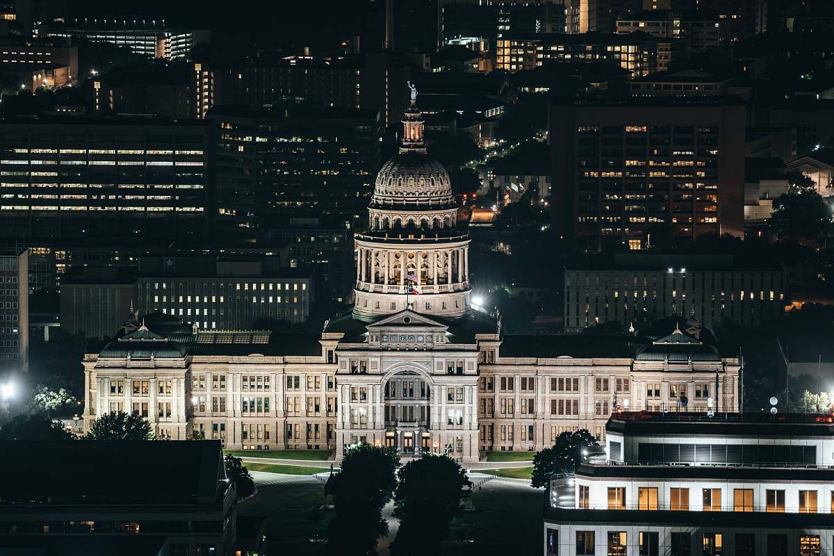 city lighted buildings at nighttime downtown