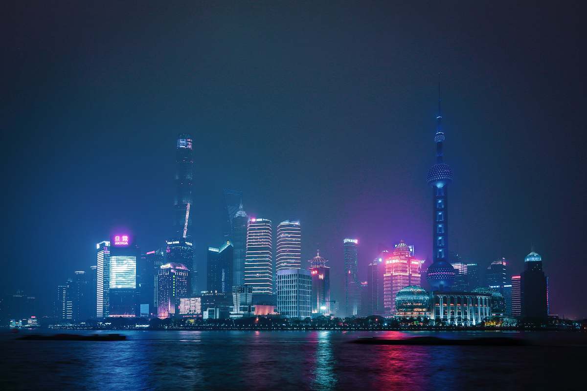 city lighted city skyline during night urban