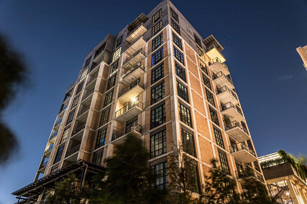 condo low angle photo of buildings housing