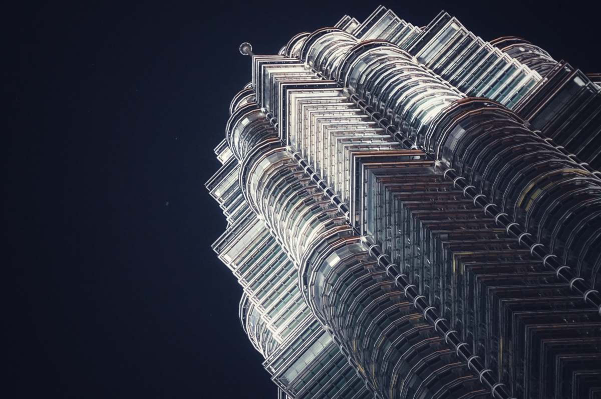 city low-angle photo of curtain wall building high rise