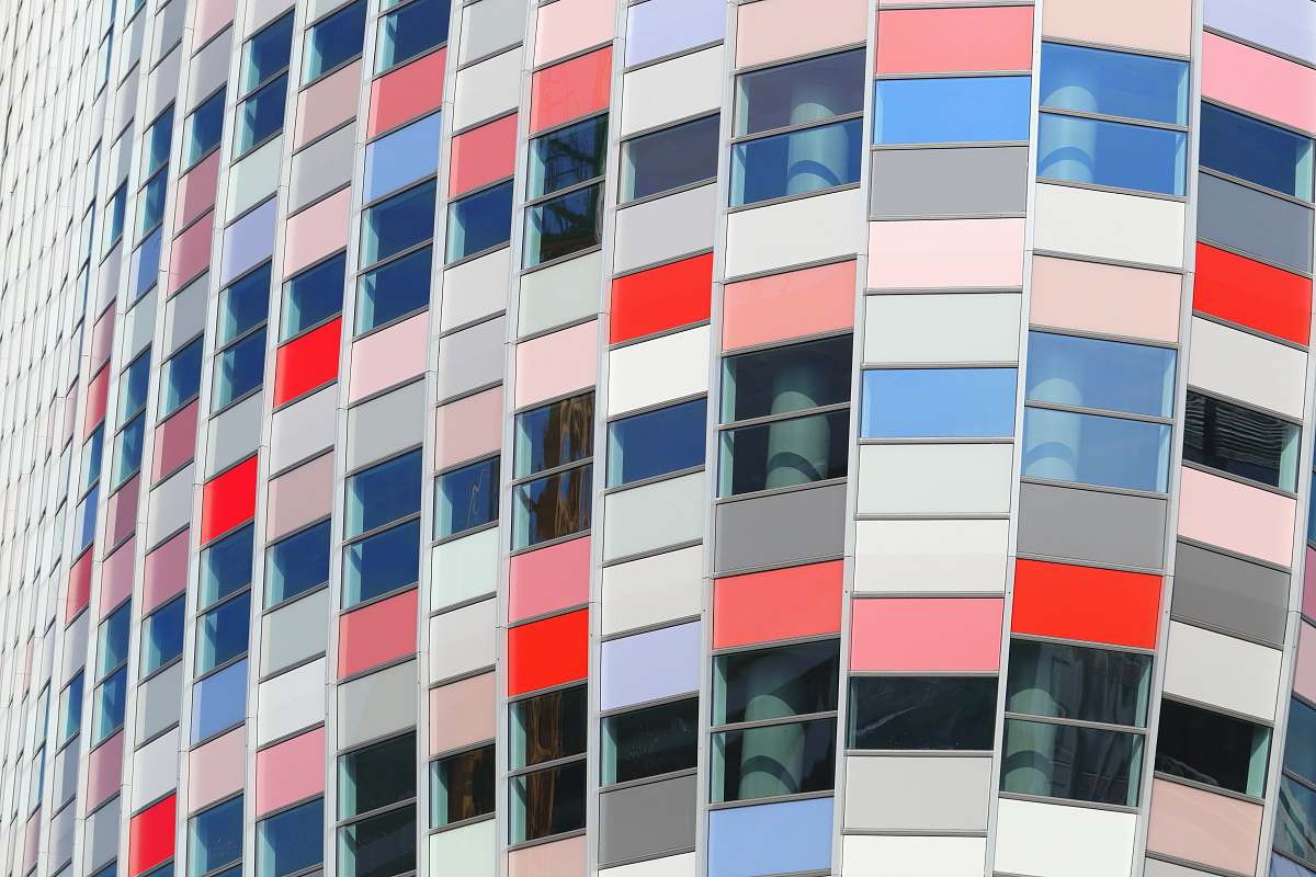 city low angle photo of glass building high rise