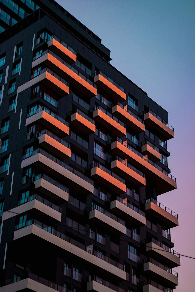 condo low angle photo of high-rise building housing