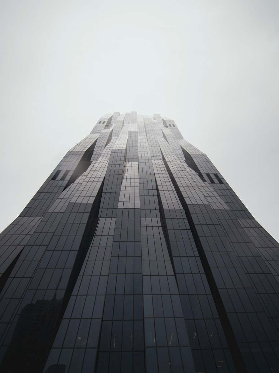 urban low-angle photography of black building town