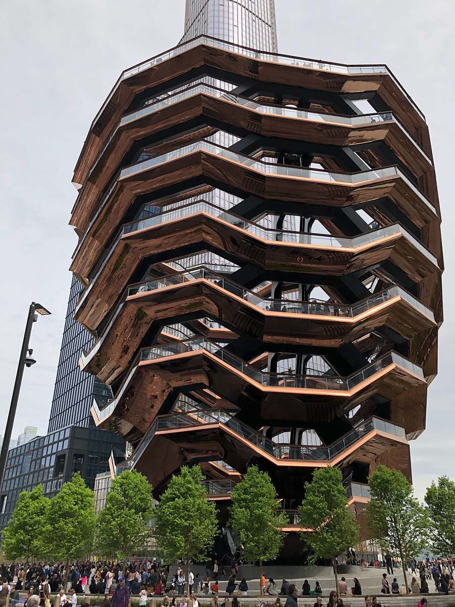 city low-angle photography of brown multi-storey building during daytime high rise