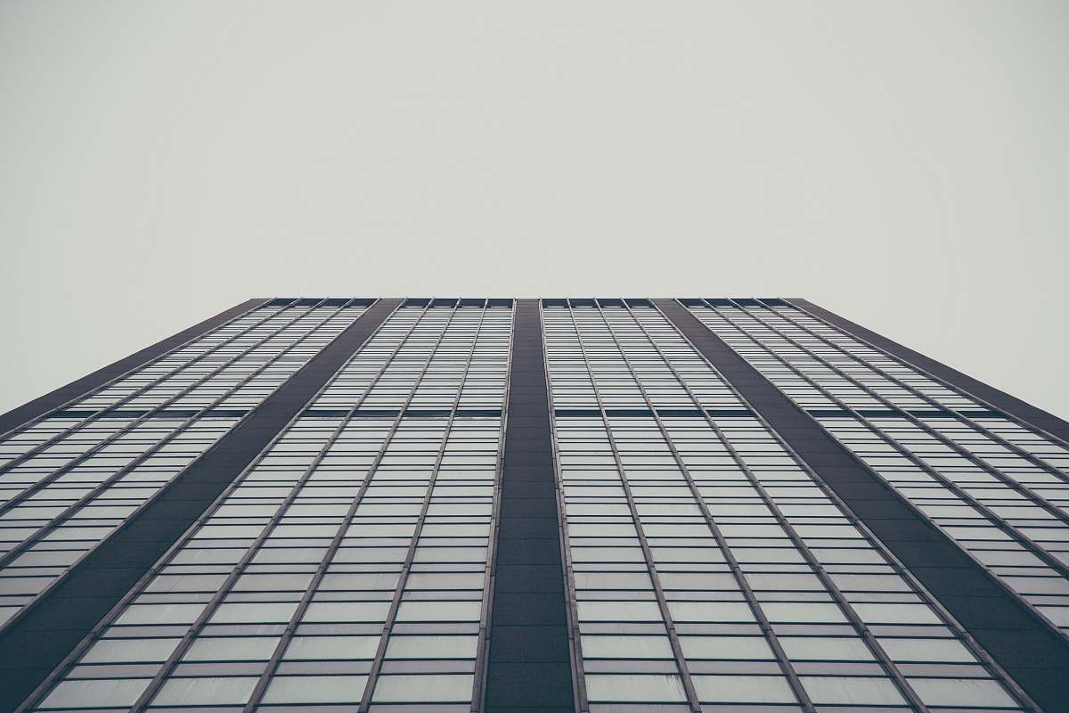 grey low-angle photography of building office building