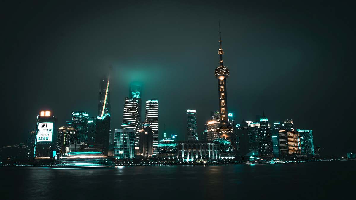 city low angle photography of city near body of water metropolis
