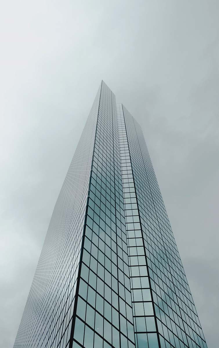 city low angle photography of concrete building grey