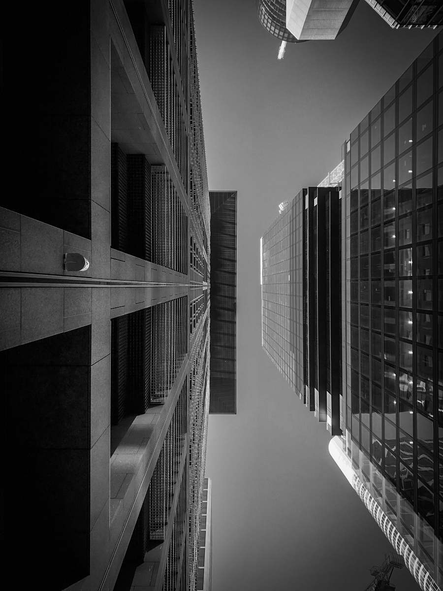 city low-angle photography of curtain building black-and-white