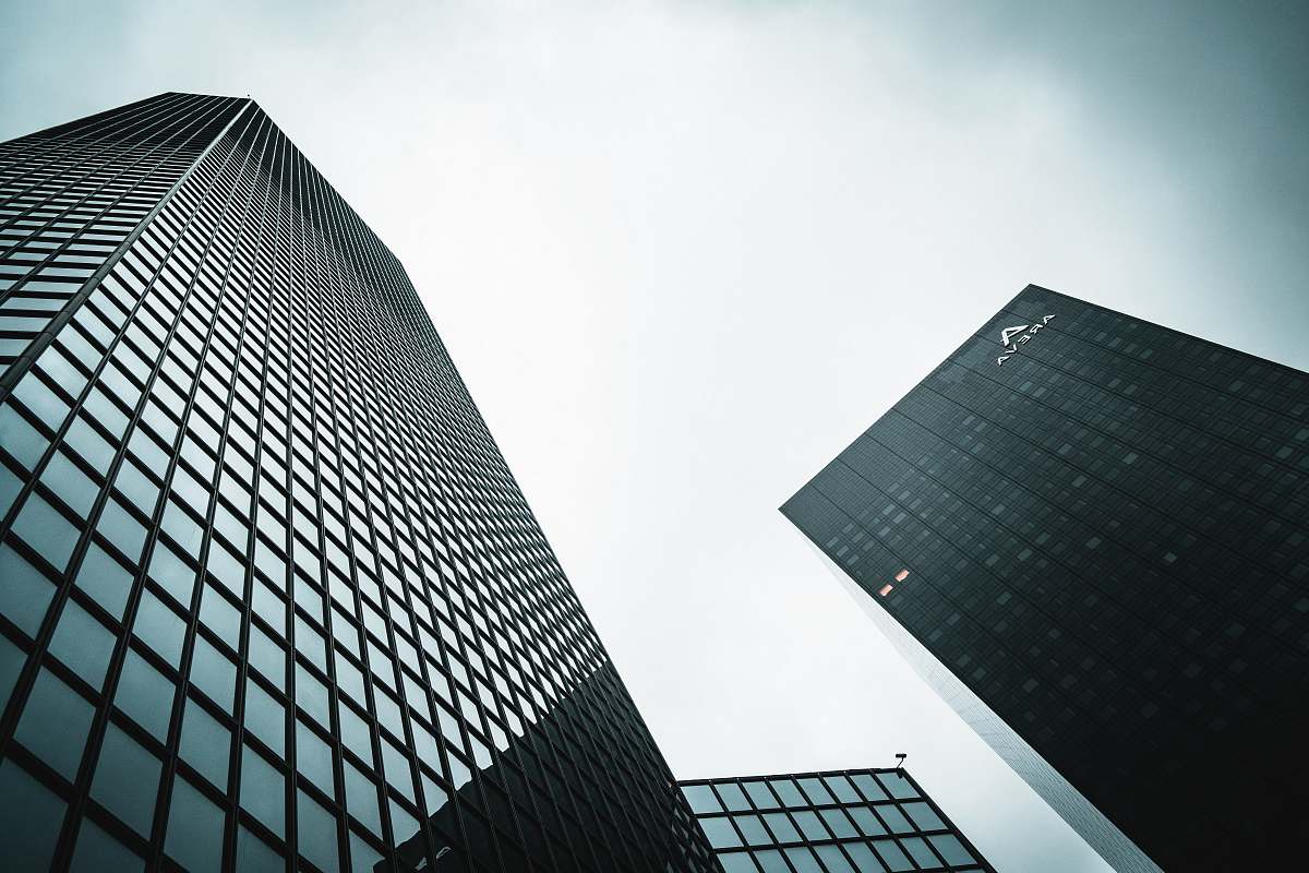 city low angle photography of curtain buildings office building
