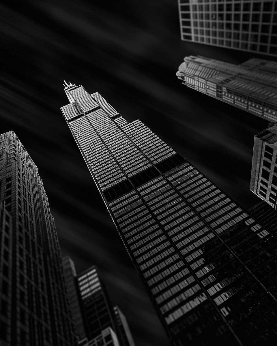 city low-angle photography of curtain wall building black-and-white