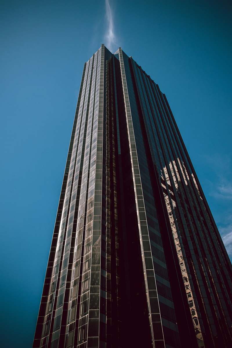city low-angle photography of curtain wall high-rise building high rise