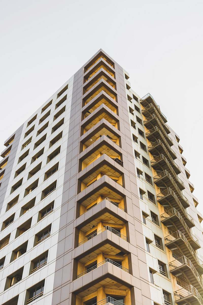 condo low-angle photography of high-rise building at daytime housing