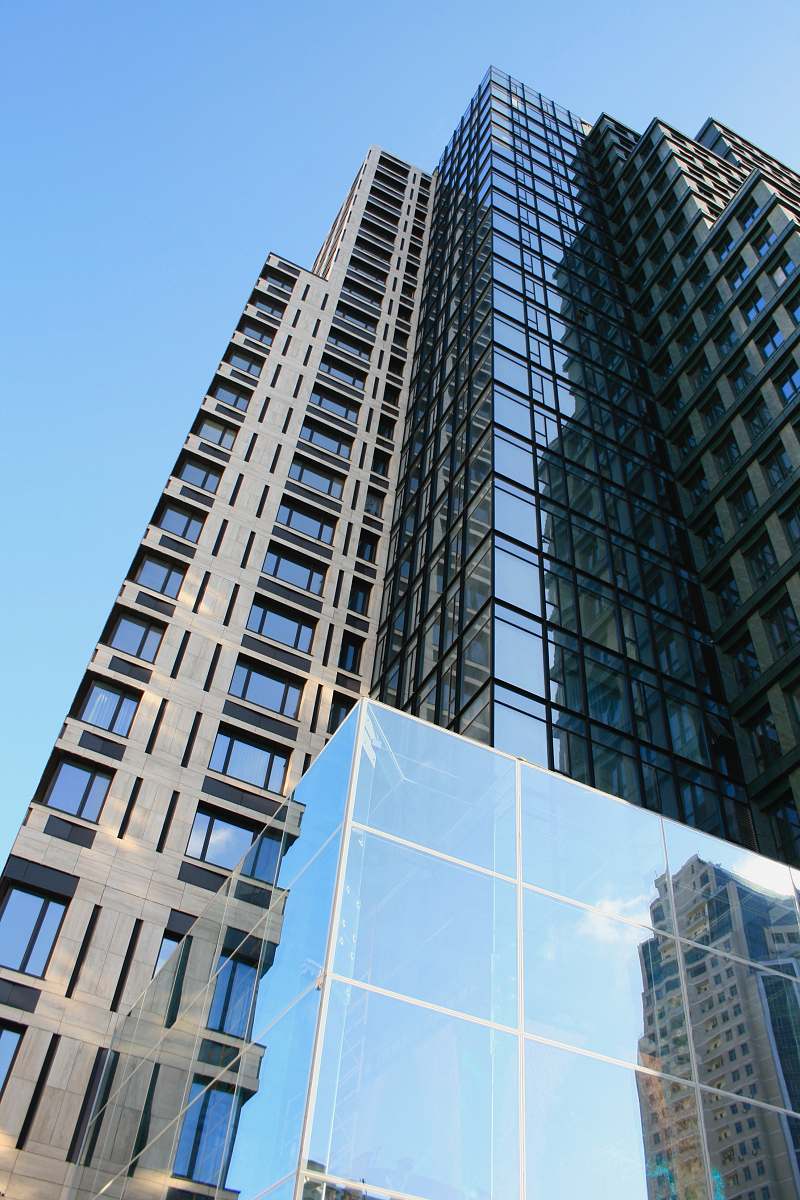 city low angle photography of high rise building during daytime office building