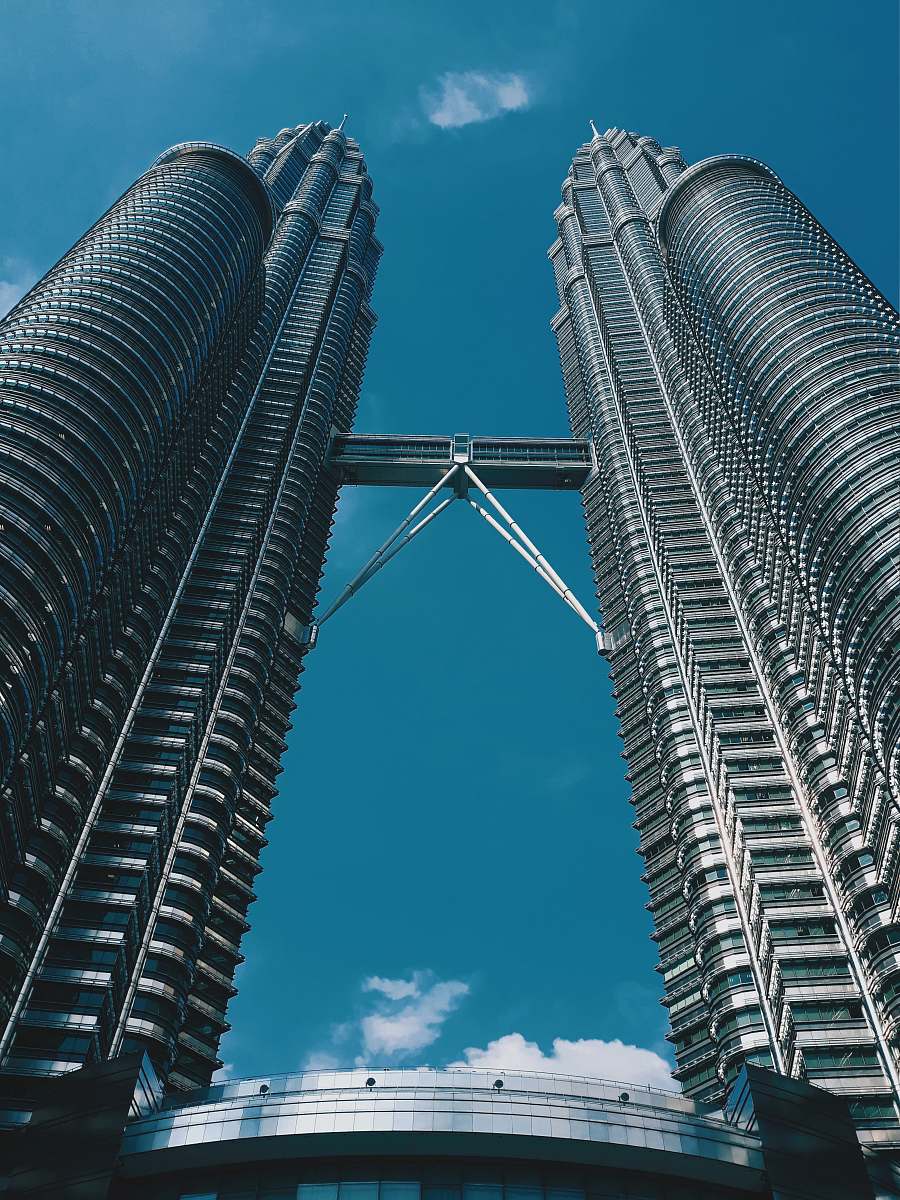 city low-angle photography of Petronas Towers in Kuala Lumpur high rise