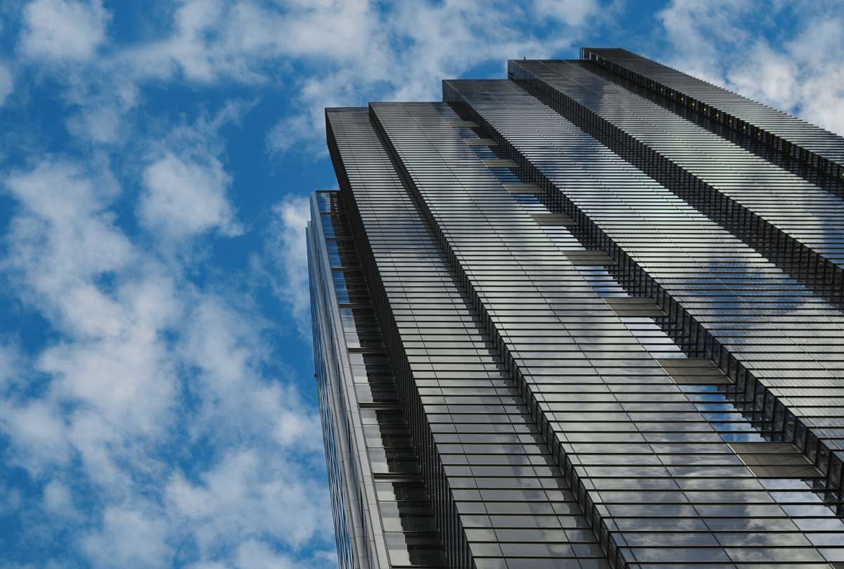 city low angle view photography of high rise building high rise