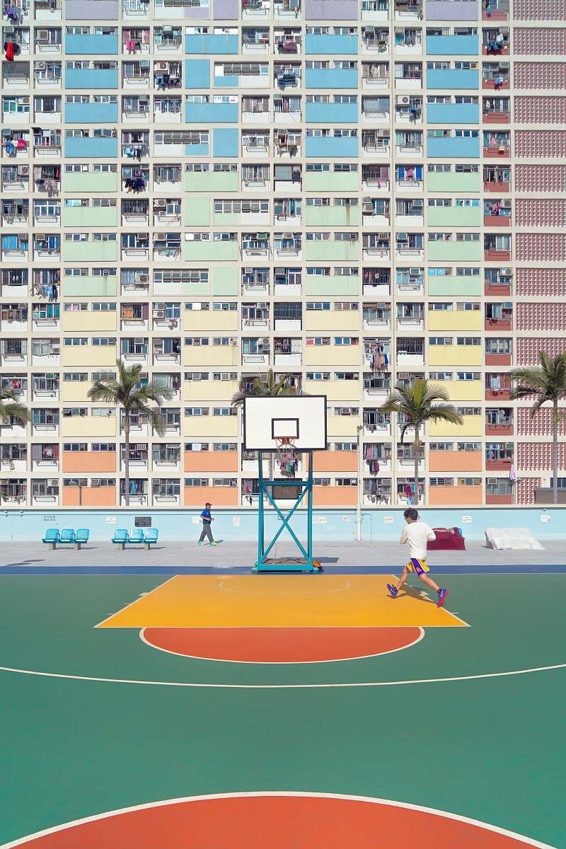 city man running on basketball court during day time basketball