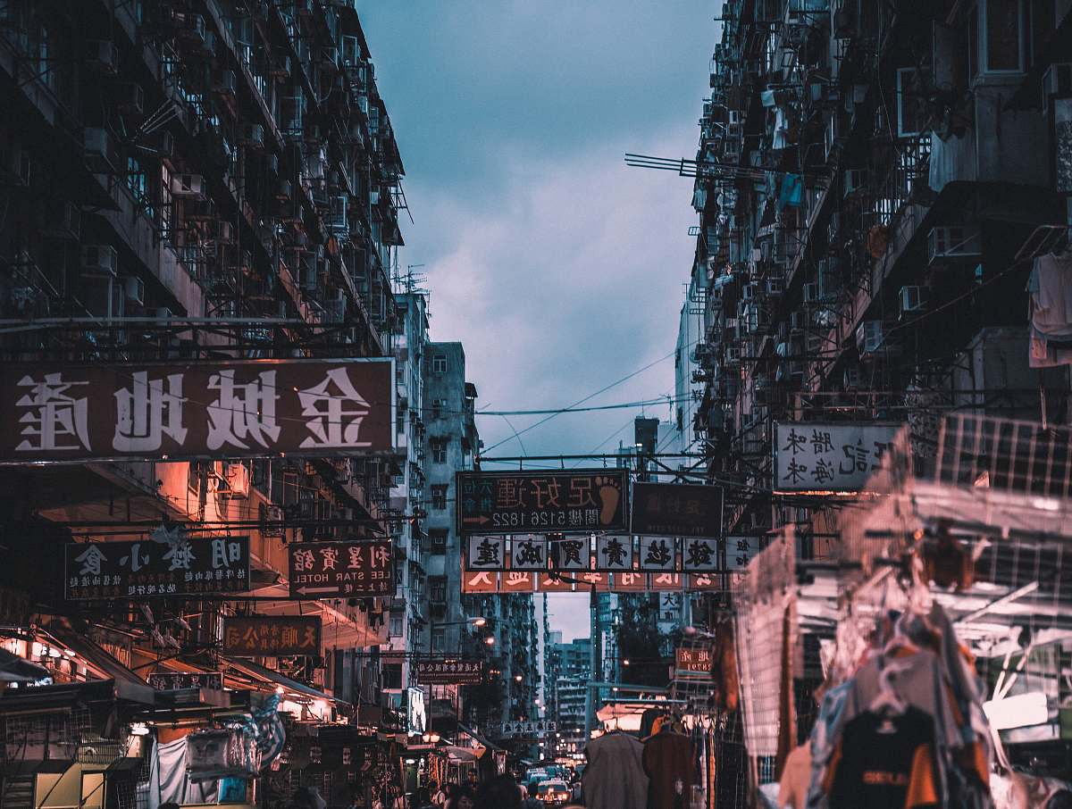 city markets on street near buildings metropolis