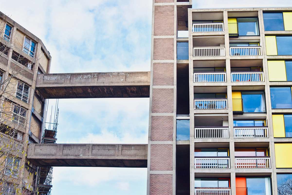 city multicolored concrete glass buildings high rise