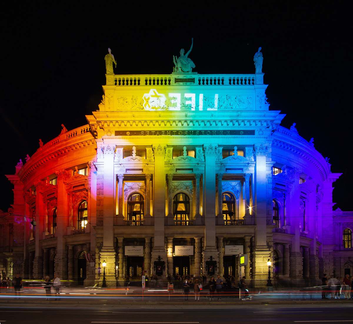 city multicolored lights from building during night time downtown