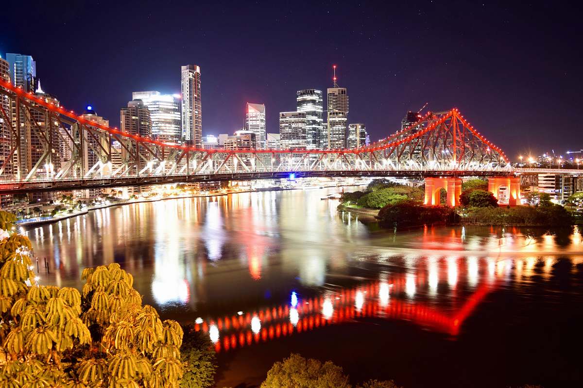 city orange and black bridge metropolis