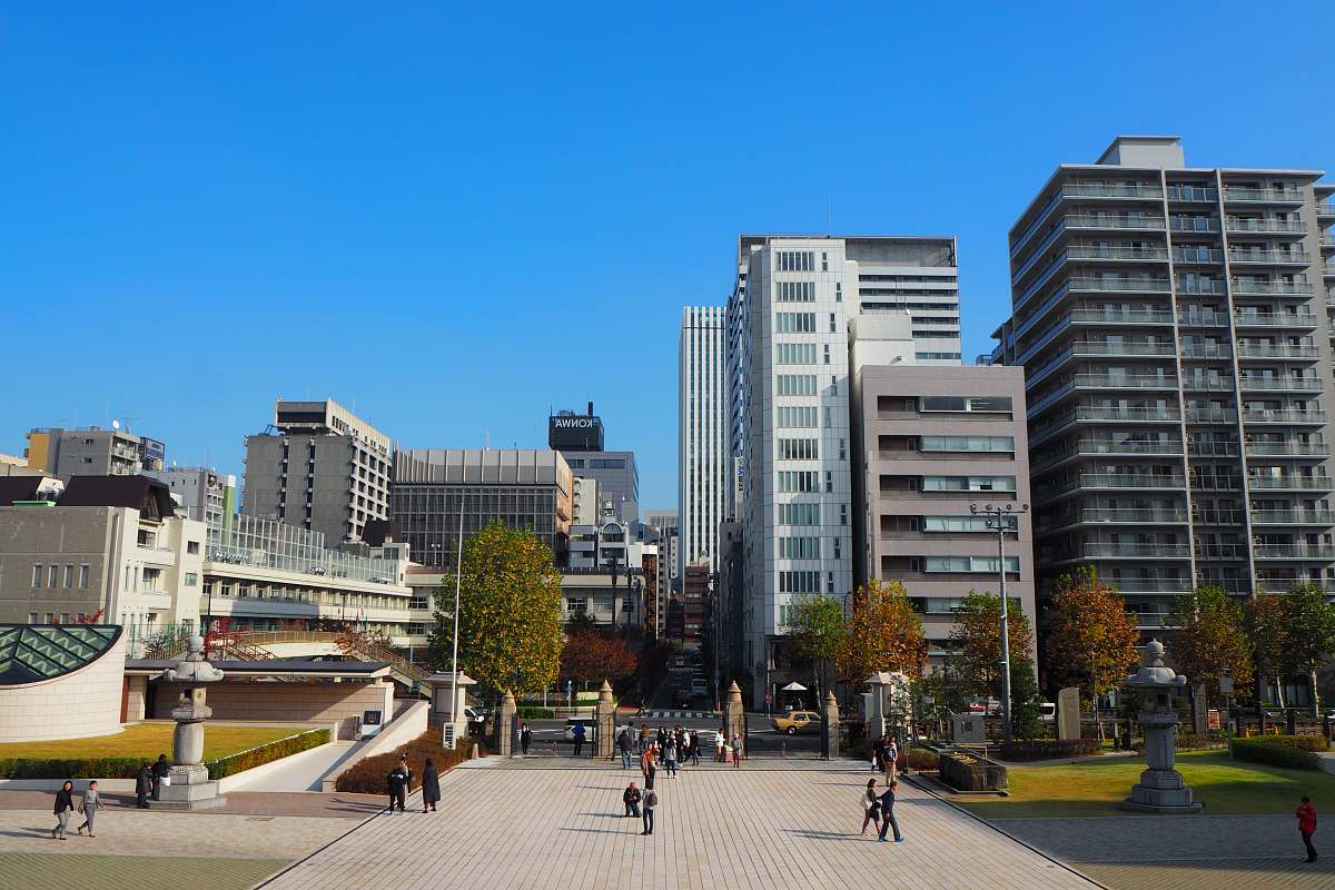 city people at the city during day downtown