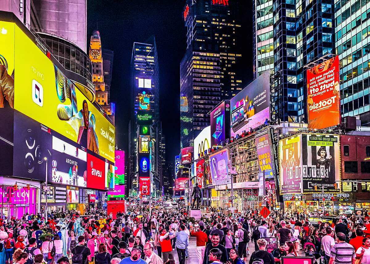 downtown people in street at nighttime town