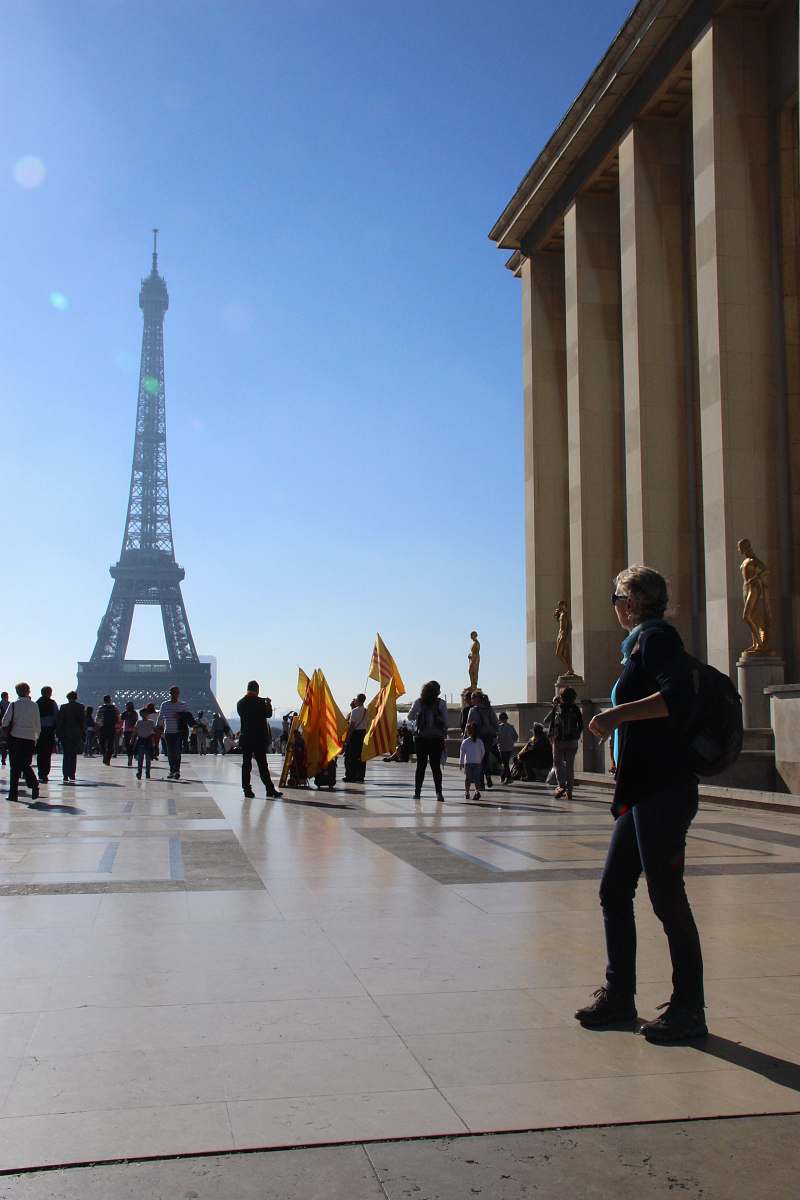 city people looking Eiffel Tower downtown