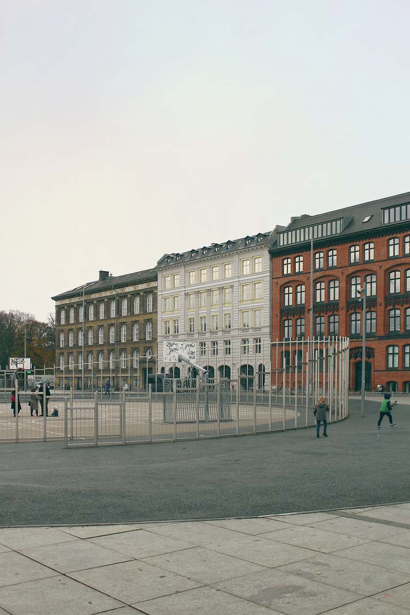 city people near buildings during day downtown