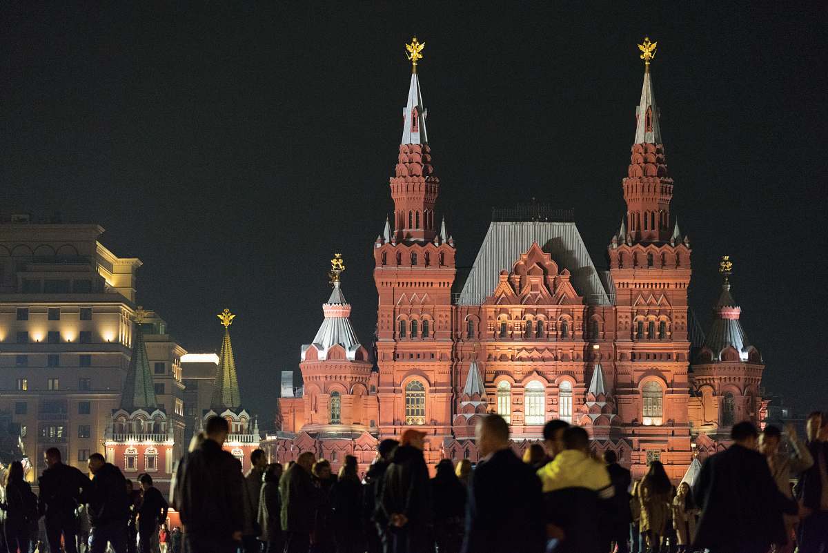 city people near State Historical Museum in Moscow Russia during night time downtown