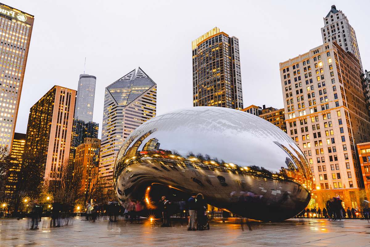 city people standing near Cloud Gate during daytime downtown
