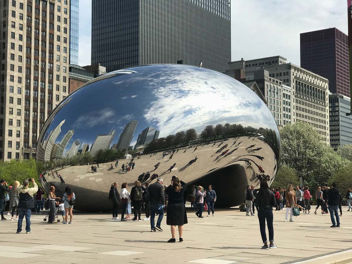 city people standing near dome building urban