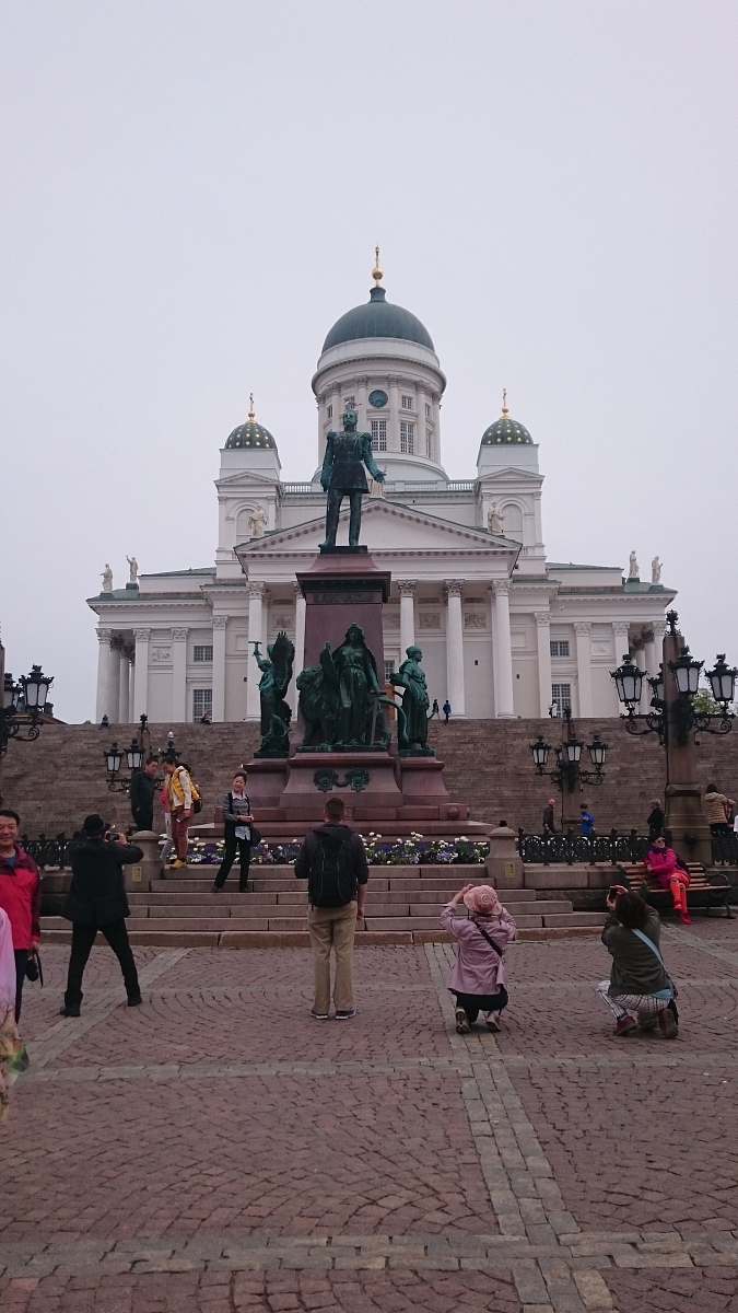city people walking near Helsinki Cathedral during daytime downtown
