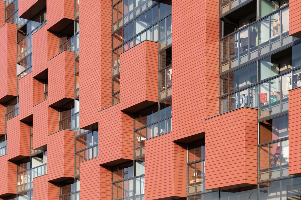 city red concrete building high rise