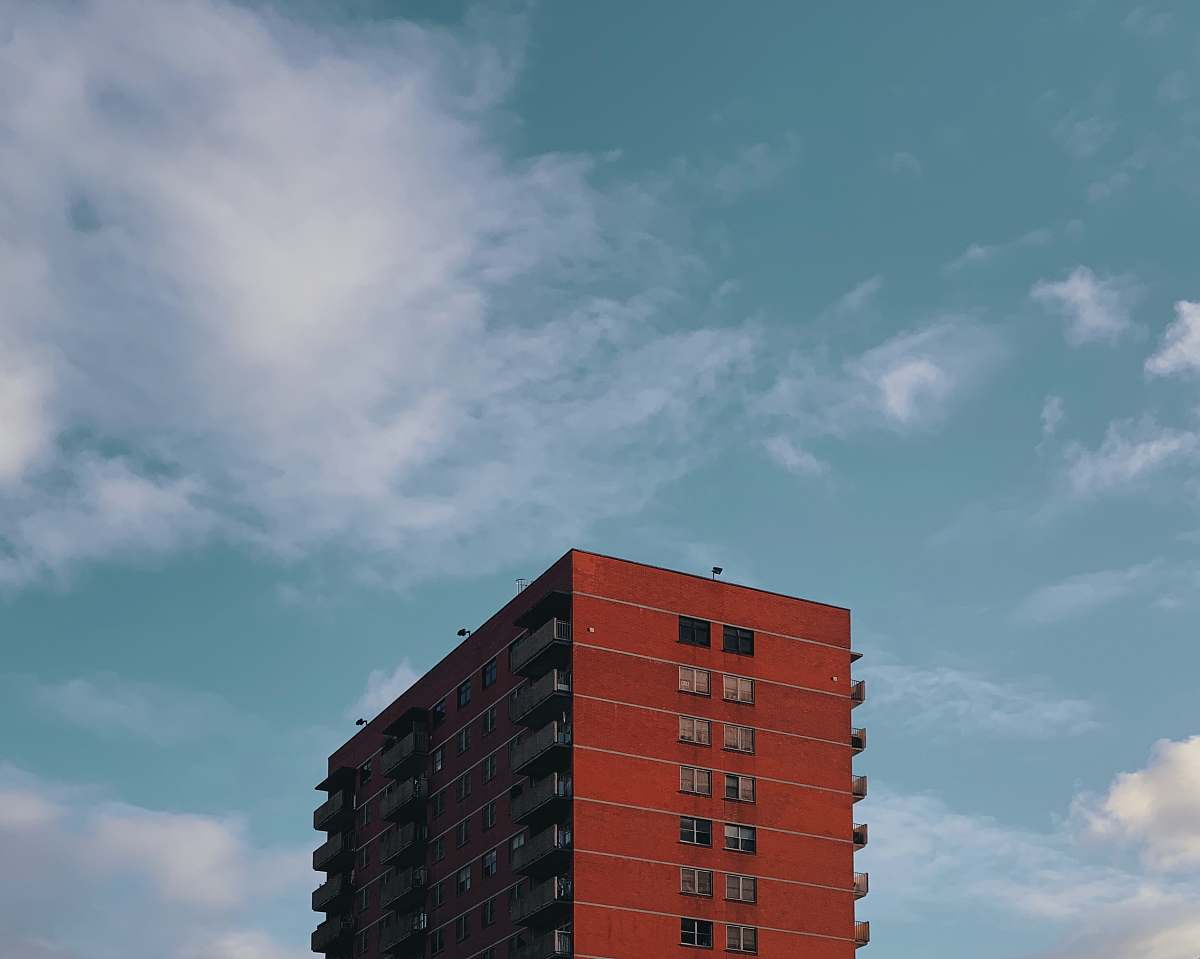 city red high rise building high rise