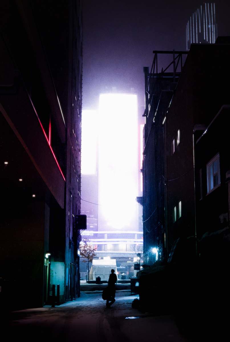town silhouette of person walking on street road