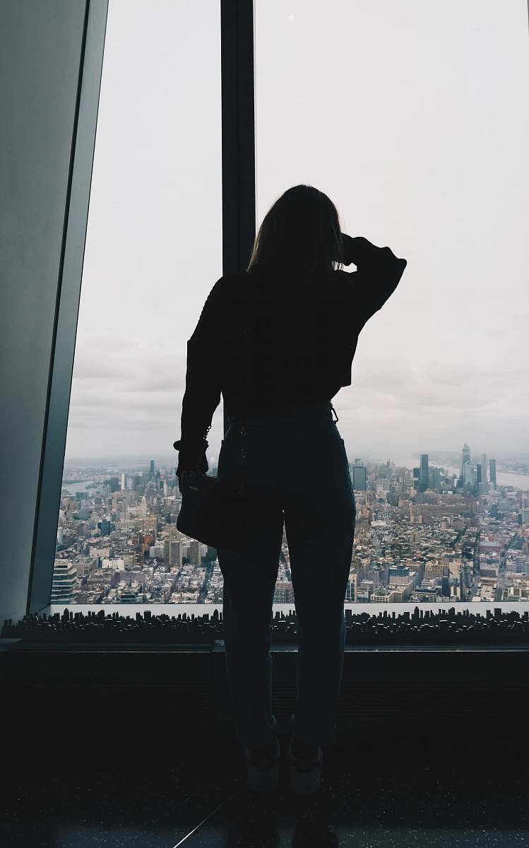 town silhouette photo of woman urban
