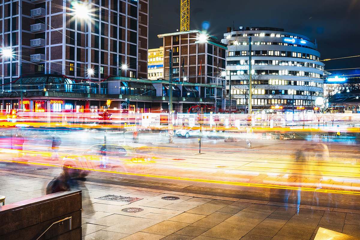 city time lapse photo of cars on road during nighttime metropolis