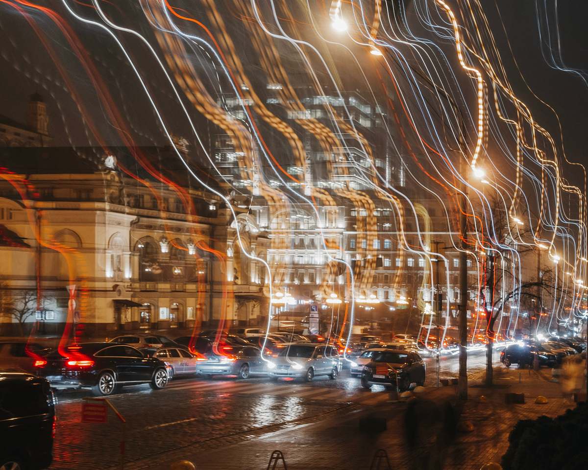 city time lapse photography of vehicles and buildings metropolis
