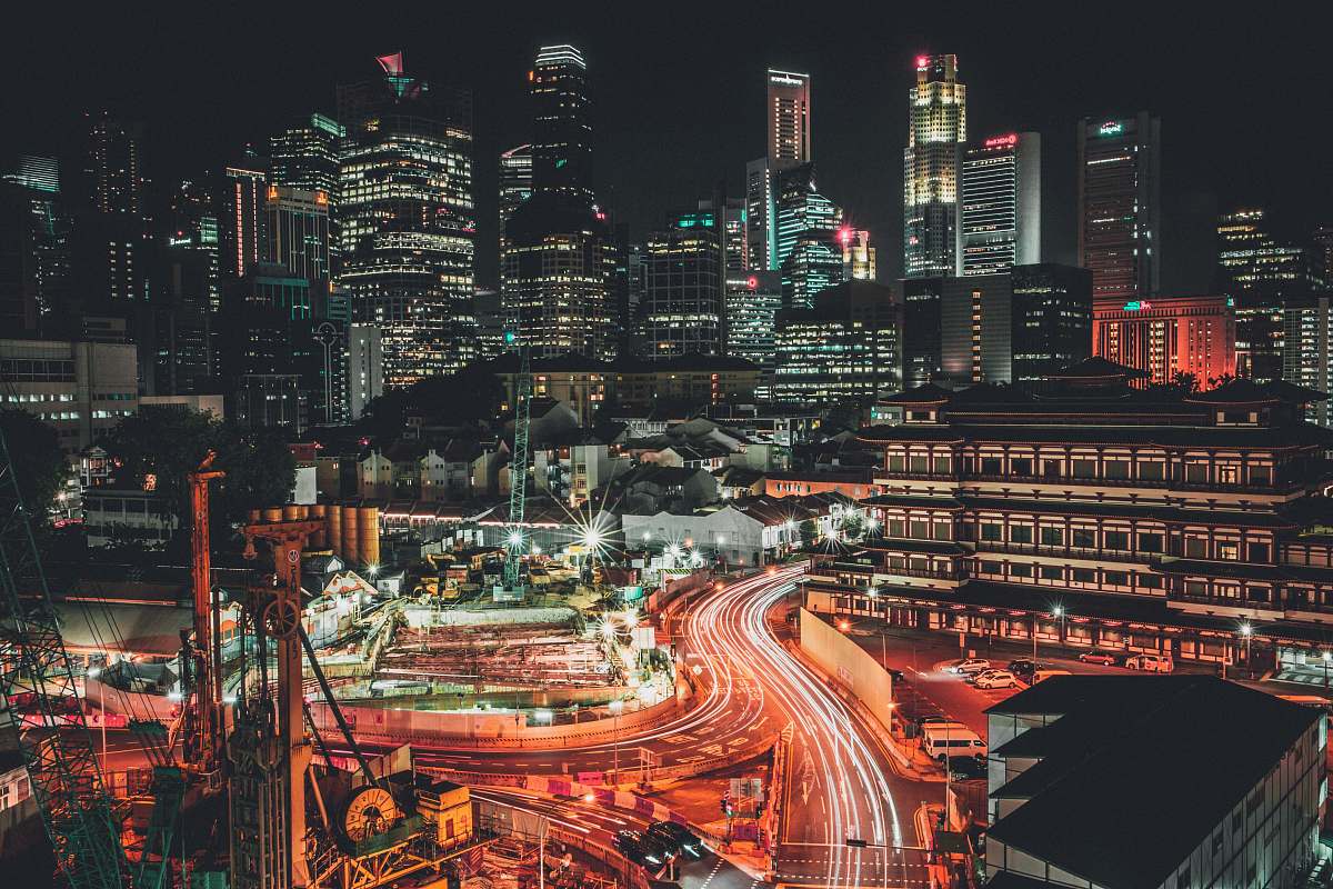 city timelapse photo of city with vehicles singapore