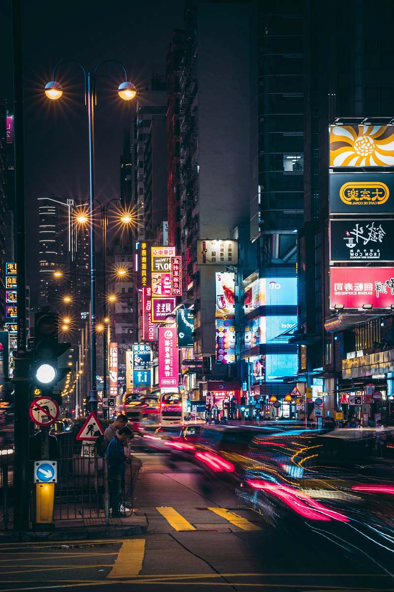 city timelapse photography of vehicles on road at night metropolis