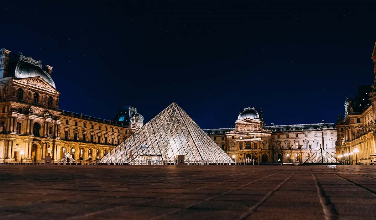 city triangular white statue downtown
