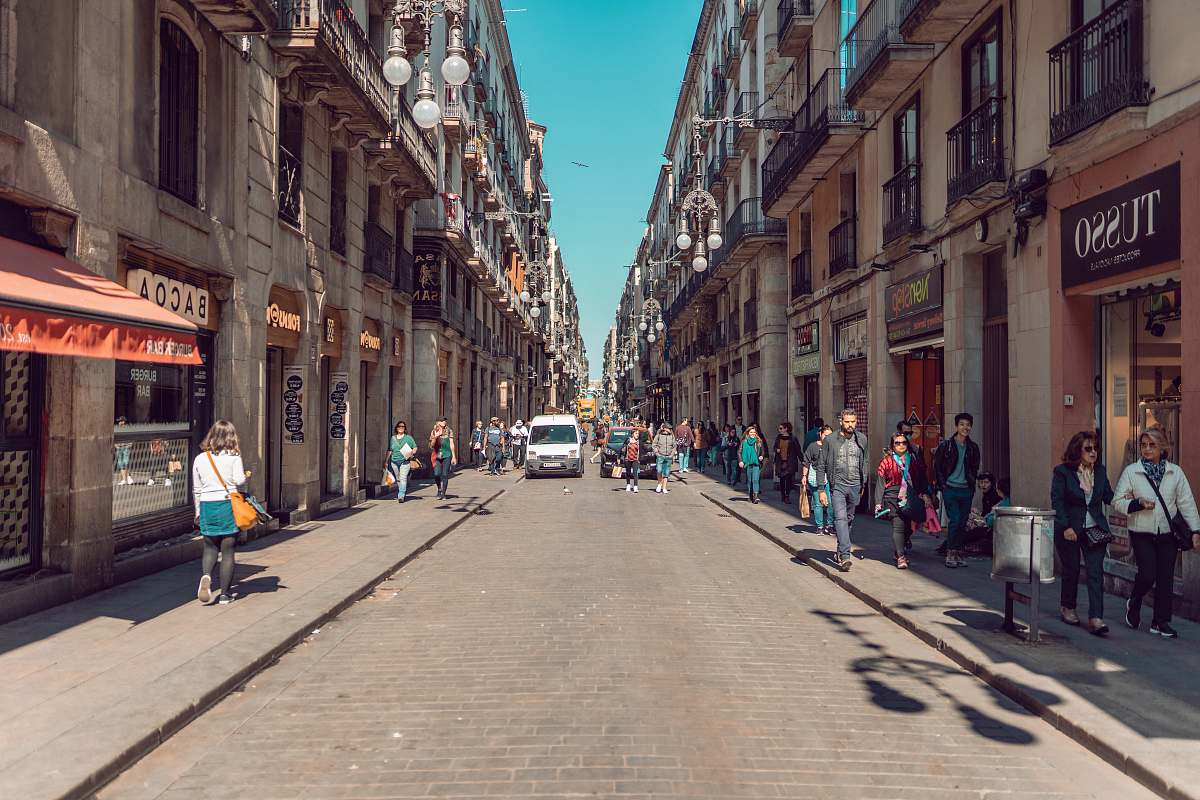 city van parked on sidewalk street