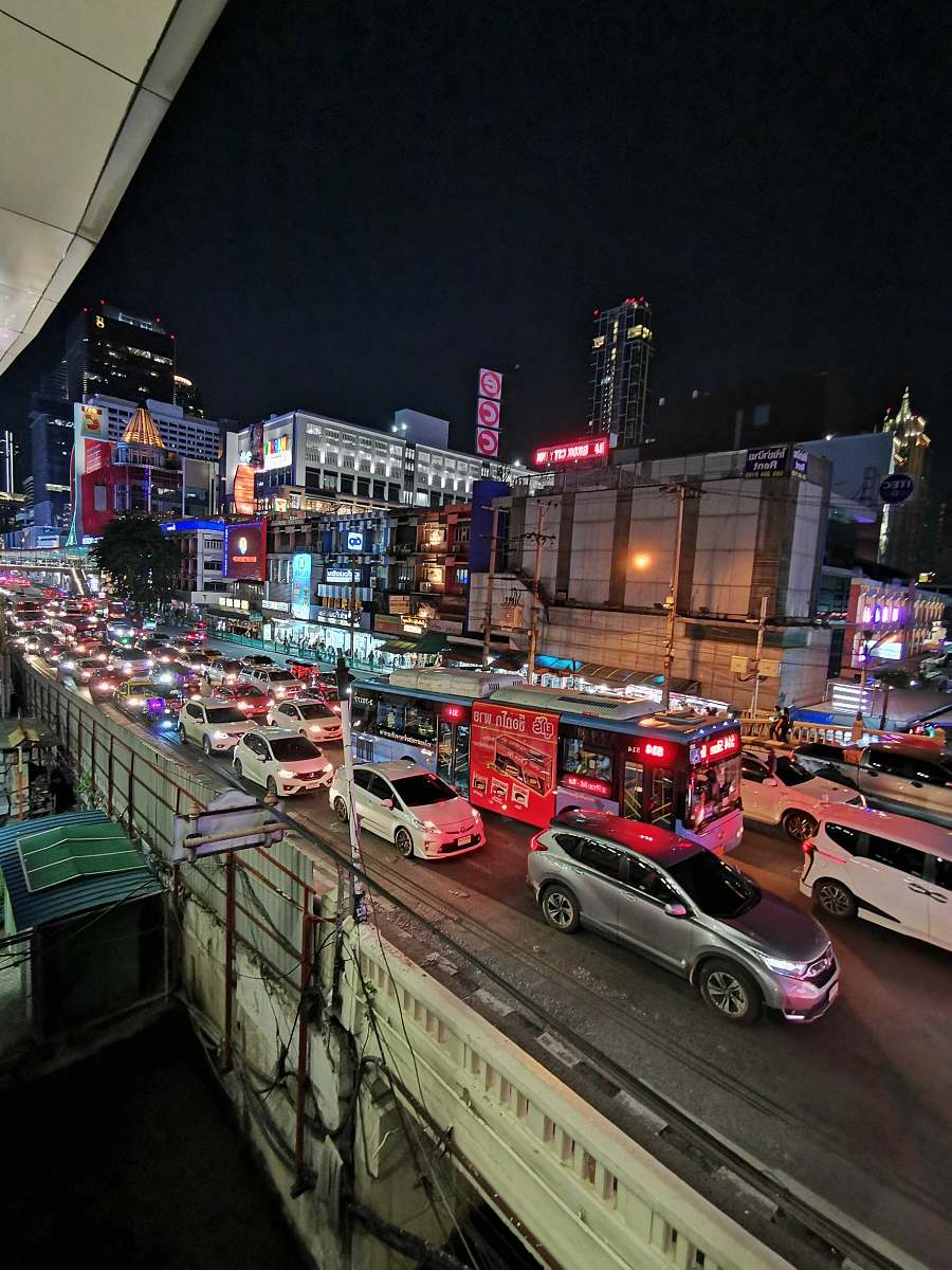 city vehicles on road during nighttime metropolis