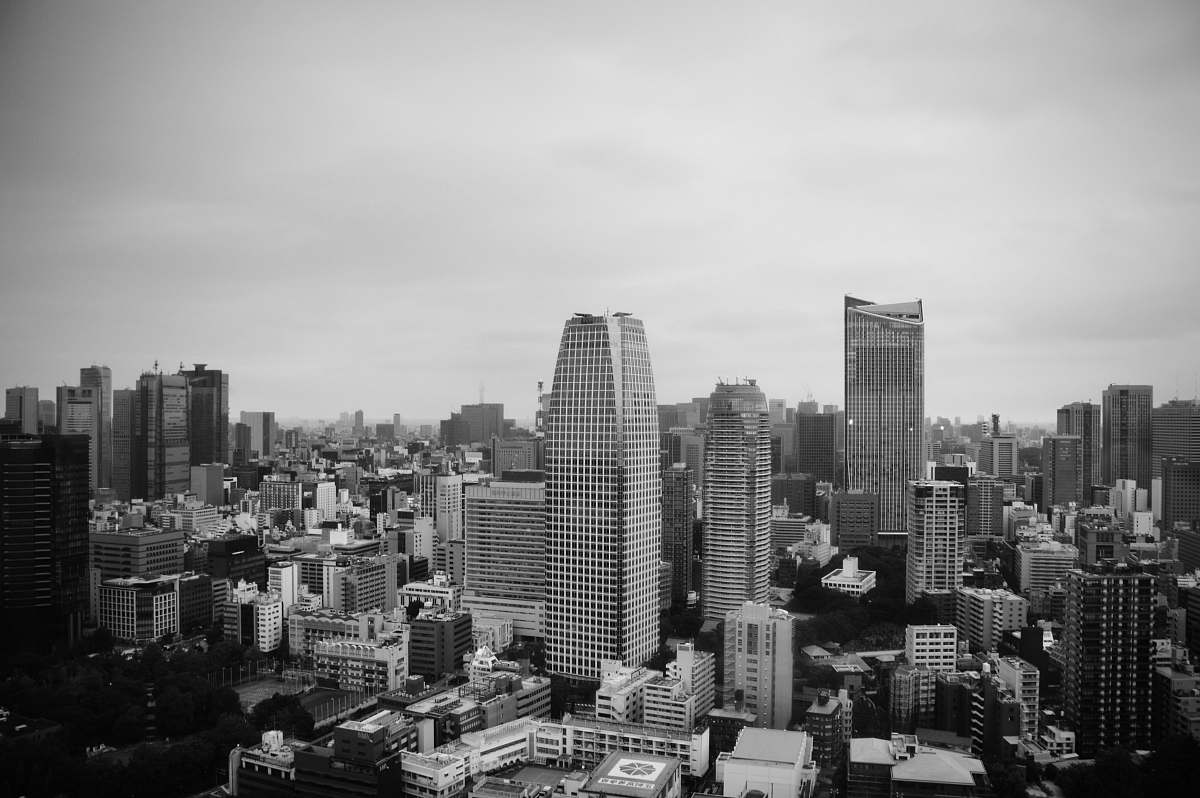 city view highrise building in grayscale photo black-and-white