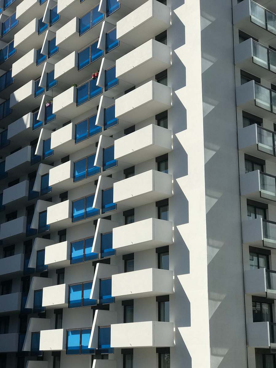 city white and blue high rise building high rise