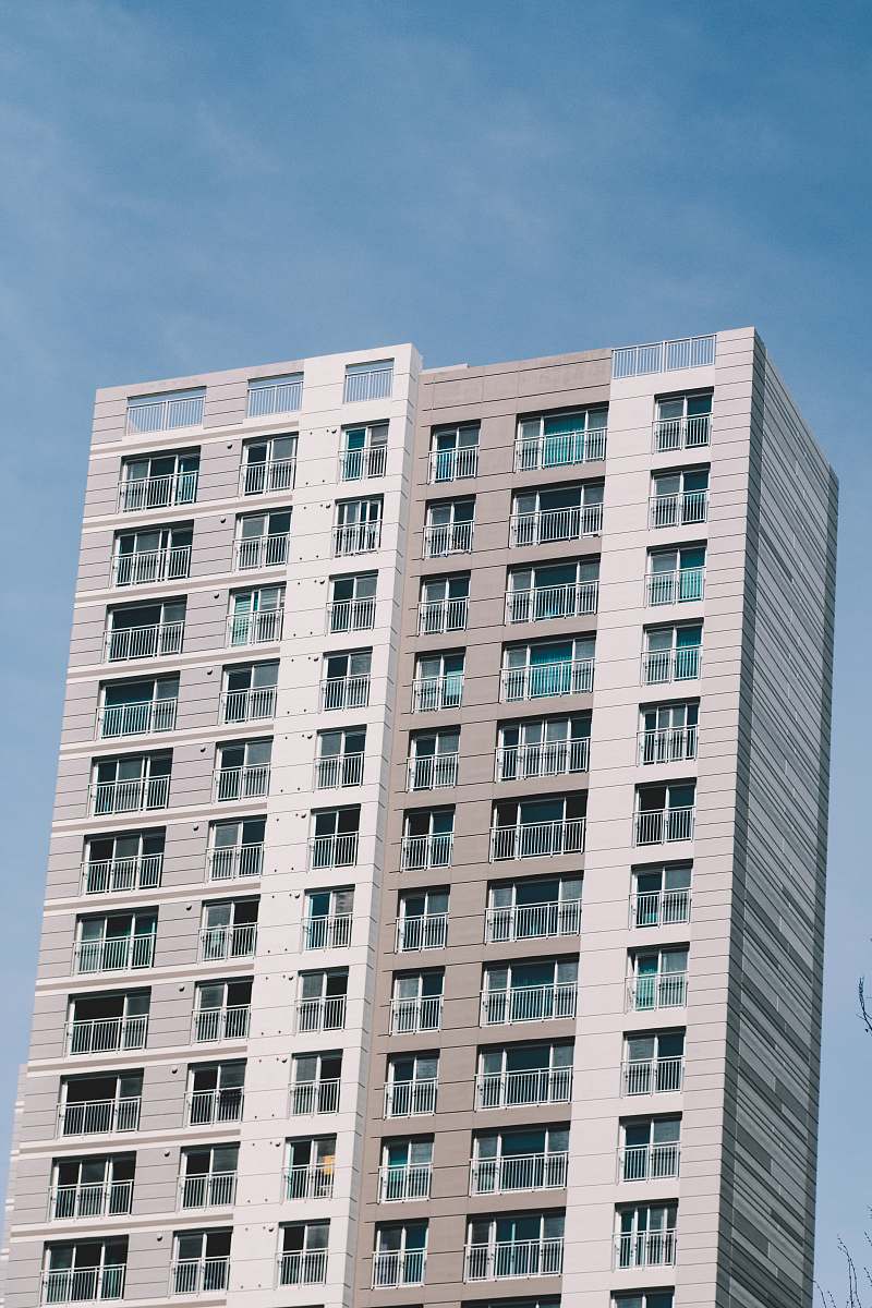 city white and brown high-rise building high rise