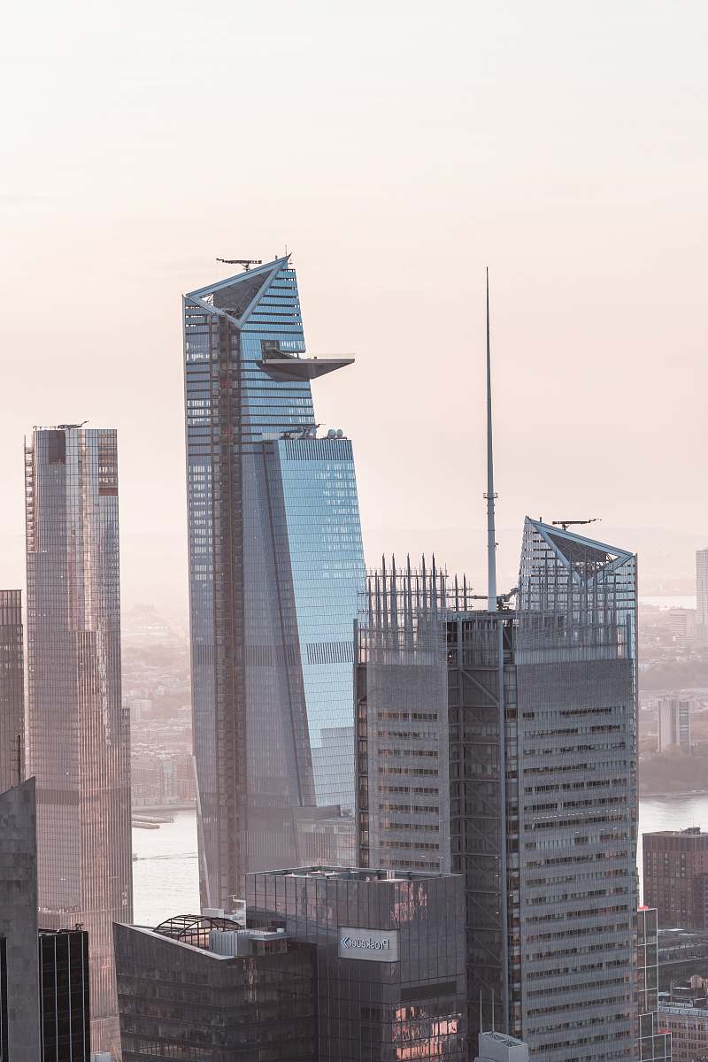 city white and gray concrete buildings at daytime high rise